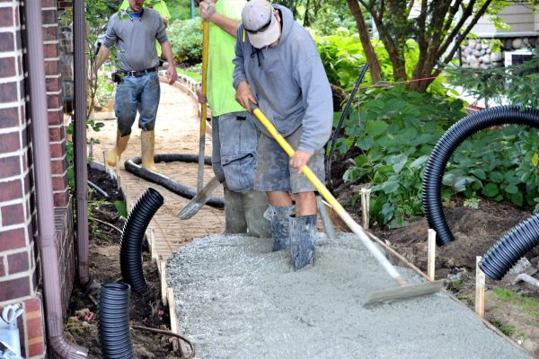 paving-a-concrete-walkway-for-home-improvement-2025-01-09-15-04-24-utc